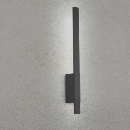 White stucco wall with metal ladder