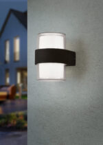 White stucco wall with metal ladder