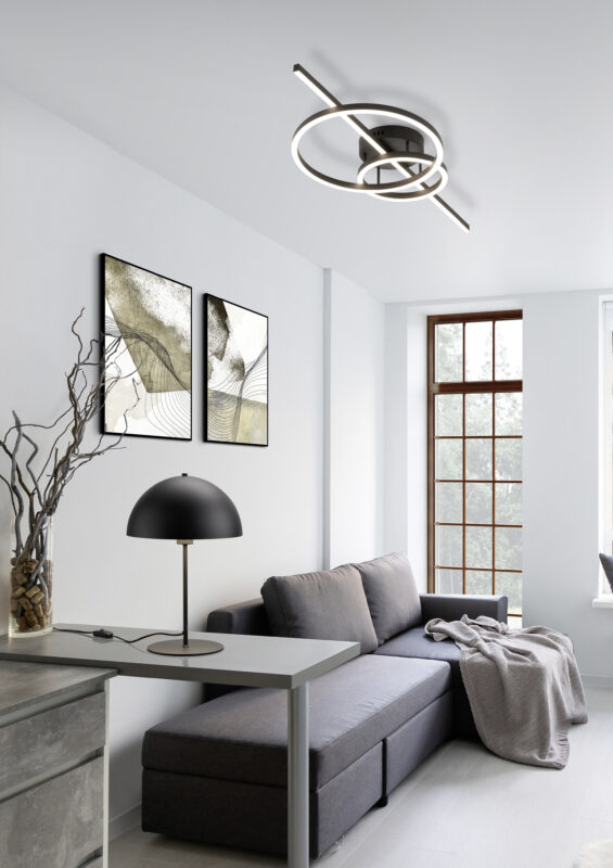 Comfortable studio apartment design. Hotel room interior with bedroom area, living space and kitchen corner. Apartment and interior concept